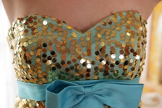 Fashionable Gold Sequined Mini Length Cocktail Dress With Blue Sash 